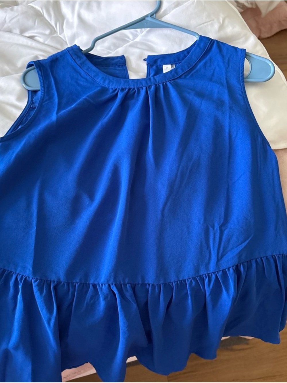 Sleeveless Ruffle-Hem Blouse in Bright Blue